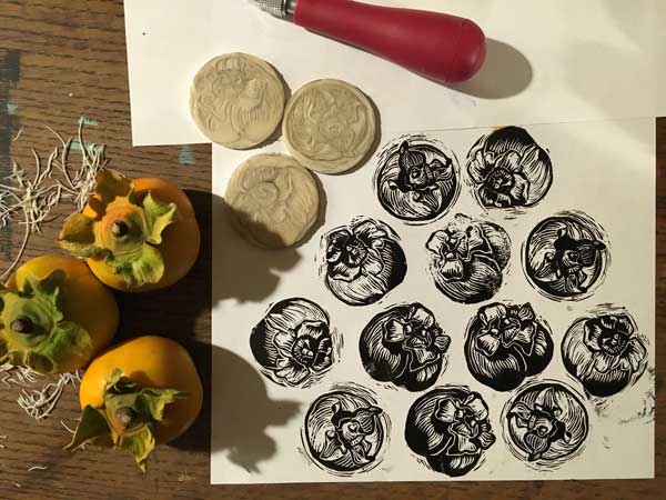 Three small Persimmon linocuts; 1.5" wide
