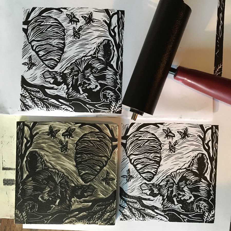 Linocut block print of the Black Bear for deVine's Black Bear Spiced Honey Rum